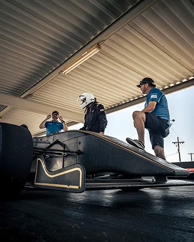 driving getting ready to go in Formula 4 car