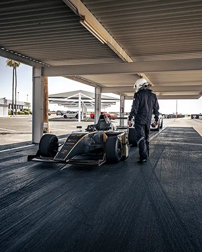 driving getting ready to go in Formula 4 car