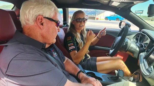 two people inside Dodge, talking